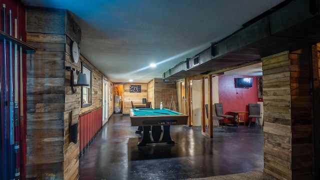 12 Riverbend Rd, Mammoth Spring, AR 72554 - rec room featuring finished concrete floors, billiards, and wooden walls