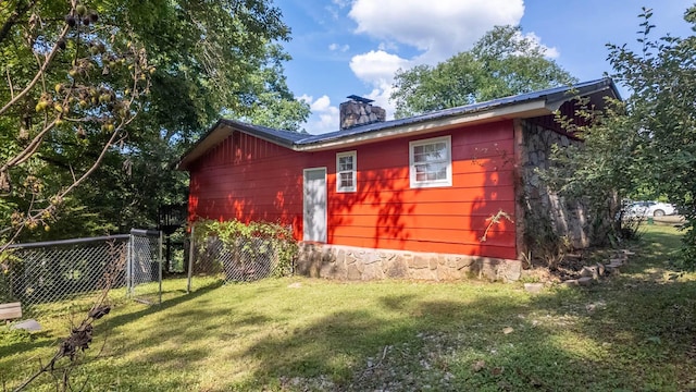 12 Riverbend Rd, Mammoth Spring, AR 72554 - view of property exterior featuring a chimney