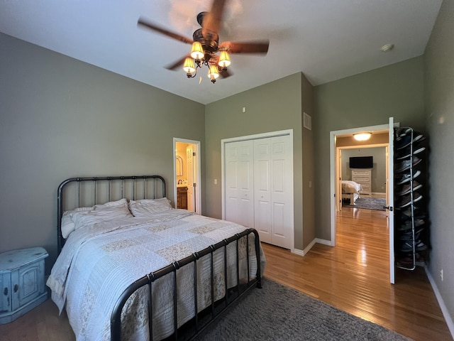 7876 County Road 3400, Mountain View, MO 65548 - bedroom featuring wood finished floors, a closet, and ceiling fan