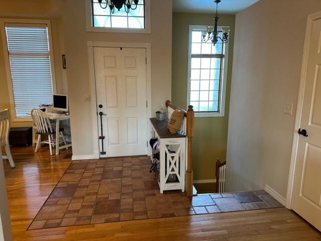7876 County Road 3400, Mountain View, MO 65548 - entryway with a chandelier, plenty of natural light, and wood finished floors