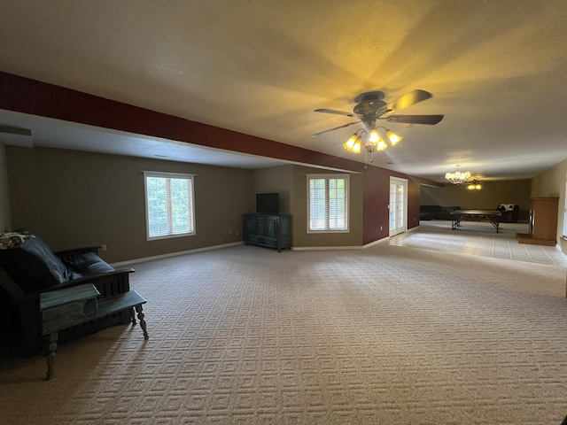 7876 County Road 3400, Mountain View, MO 65548 - unfurnished living room featuring a chandelier, healthy amount of natural light, ceiling fan, and light carpet