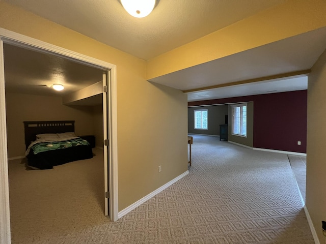 7876 County Road 3400, Mountain View, MO 65548 - hallway with carpet flooring and baseboards