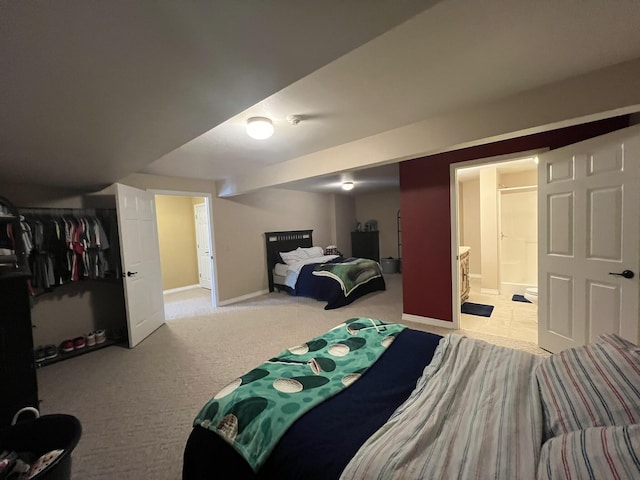 7876 County Road 3400, Mountain View, MO 65548 - carpeted bedroom featuring ensuite bathroom and a closet