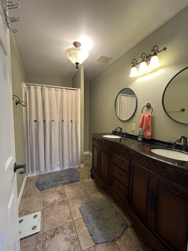 7876 County Road 3400, Mountain View, MO 65548 - full bath featuring double vanity and a textured ceiling