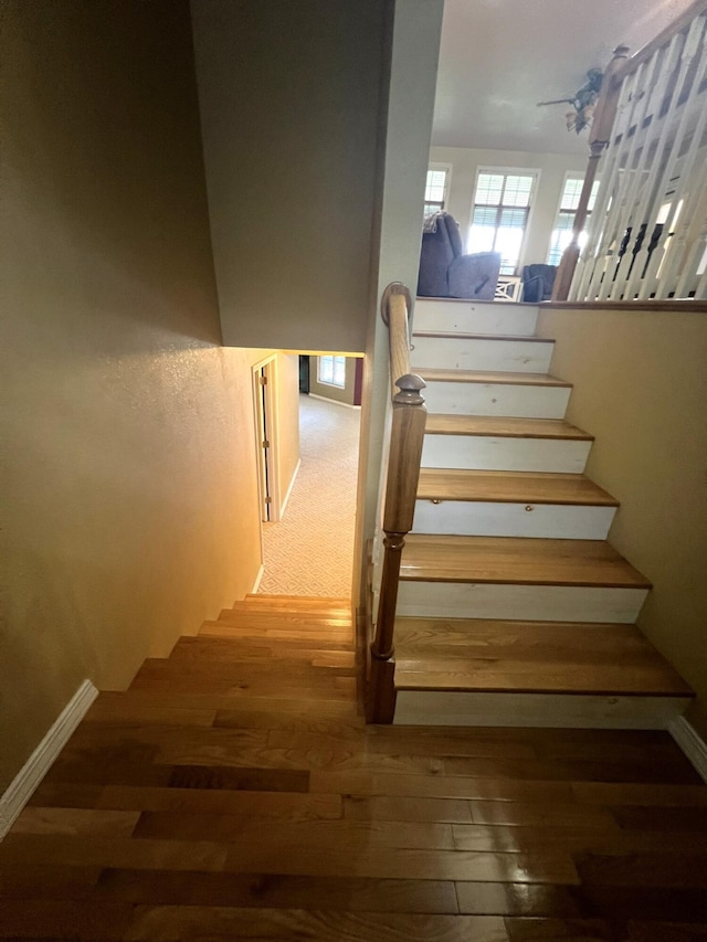 7876 County Road 3400, Mountain View, MO 65548 - stairs with hardwood / wood-style floors and baseboards