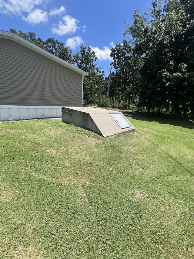 2039 US Highway 65, Buffalo, MO 65622 - view of storm shelter with a yard