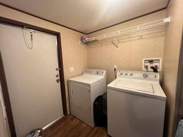2039 US Highway 65, Buffalo, MO 65622 - laundry room featuring washing machine and clothes dryer, dark wood-type flooring, and ornamental molding