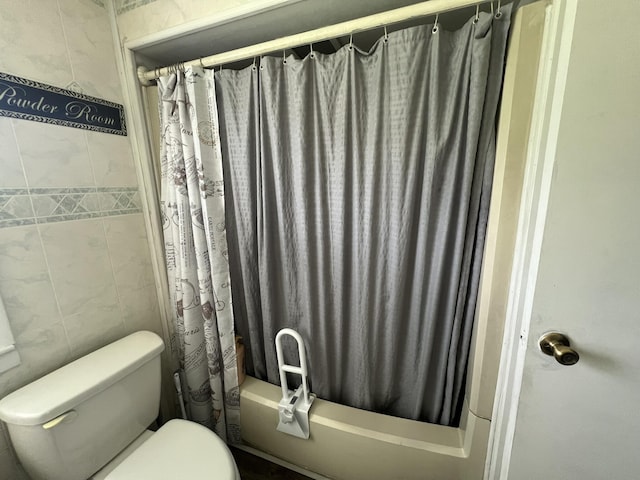2039 US Highway 65, Buffalo, MO 65622 - full bathroom featuring shower / tub combo and tile walls