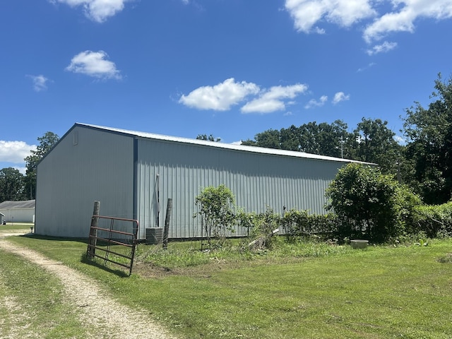 2039 US Highway 65, Buffalo, MO 65622 - view of pole building featuring a yard