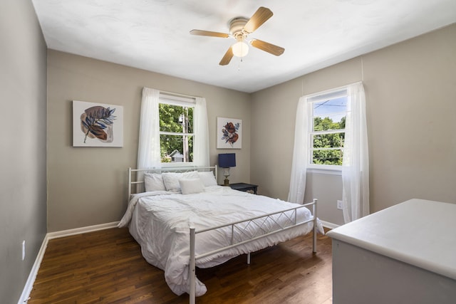 3430 S Elmview Ave, Springfield, MO 65804 - bedroom featuring dark wood-style flooring and a ceiling fan