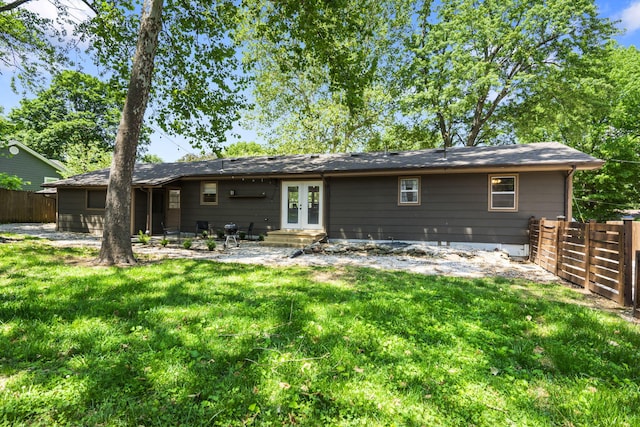 3430 S Elmview Ave, Springfield, MO 65804 - back of property with french doors, a patio, and entry steps
