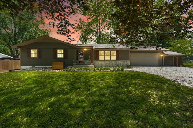 3430 S Elmview Ave, Springfield, MO 65804 - ranch-style home with a garage and gravel driveway