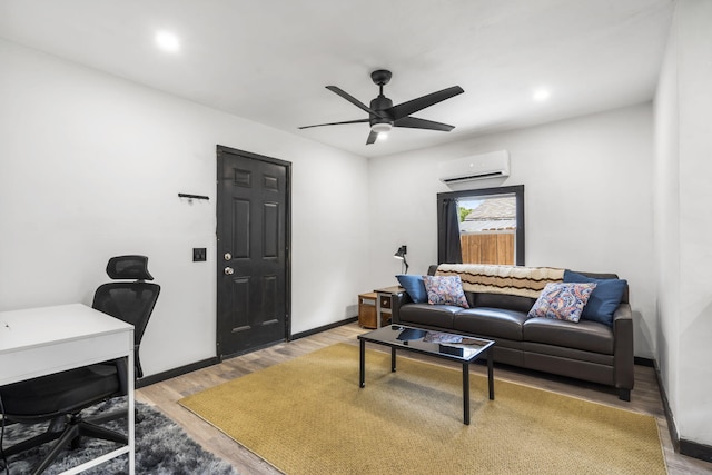 3430 S Elmview Ave, Springfield, MO 65804 - living area with a wall mounted AC, ceiling fan, light wood-style floors, an office area, and recessed lighting