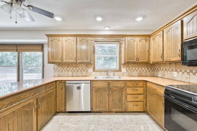 5751 S Kings Ave, Springfield, MO 65810 - kitchen featuring black appliances, light countertops, tasteful backsplash, ceiling fan, and recessed lighting