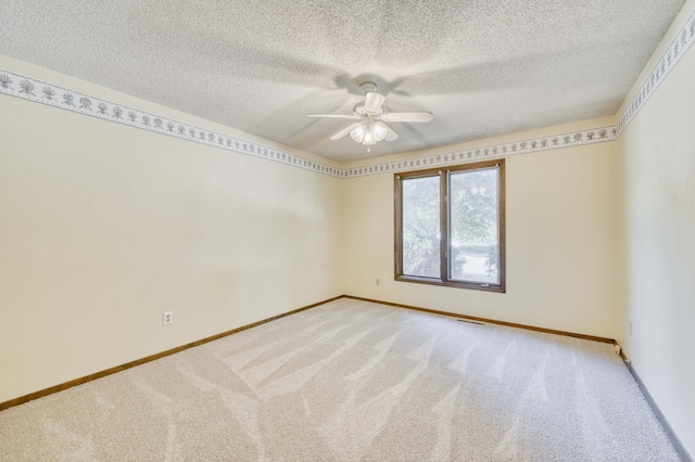 5751 S Kings Ave, Springfield, MO 65810 - empty room featuring light carpet, a textured ceiling, and ceiling fan