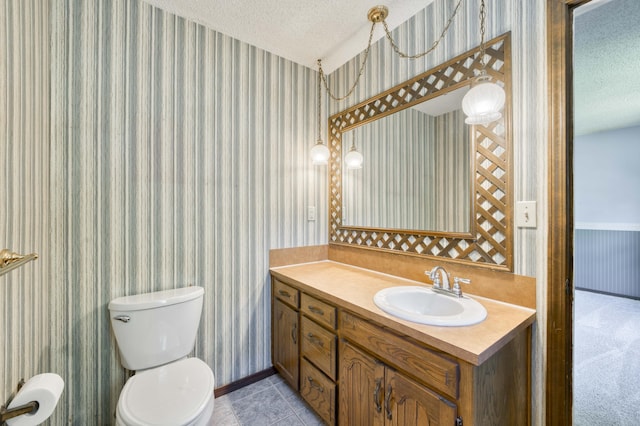 5751 S Kings Ave, Springfield, MO 65810 - half bath with a textured ceiling, wallpapered walls, vanity, and tile patterned floors