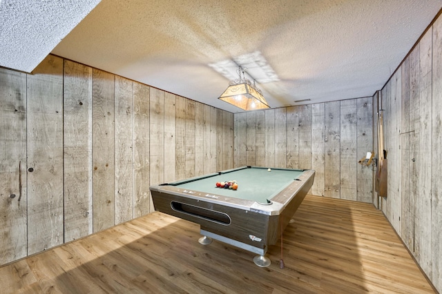 5751 S Kings Ave, Springfield, MO 65810 - recreation room with wood finished floors, a textured ceiling, wood walls, and billiards