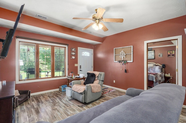 1360 Johnson Rd, Sparta, MO 65753 - living room with wood finished floors and a ceiling fan