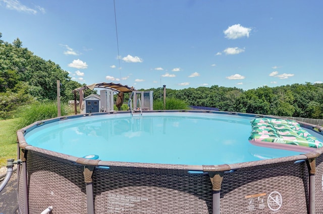 1360 Johnson Rd, Sparta, MO 65753 - outdoor pool with a storage shed