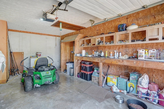 1360 Johnson Rd, Sparta, MO 65753 - garage featuring a garage door opener