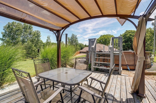 1360 Johnson Rd, Sparta, MO 65753 - wooden terrace featuring outdoor dining space