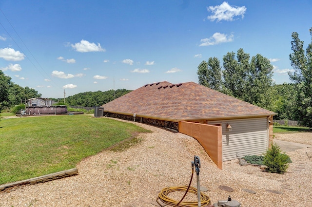 1360 Johnson Rd, Sparta, MO 65753 - view of side of property featuring a lawn and roof with shingles