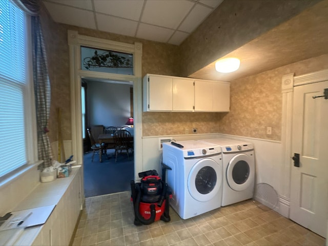 1414 N Clay Ave, Springfield, MO 65802 - laundry area featuring cabinet space, independent washer and dryer, wainscoting, and light flooring
