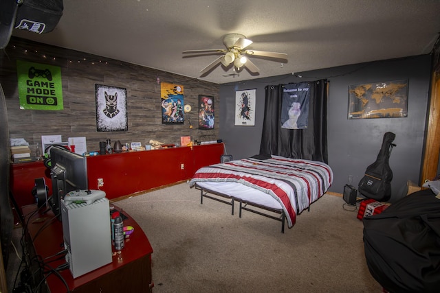 301 N Gregg Rd, Nixa, MO 65714 - carpeted bedroom with wooden walls, ceiling fan, and a textured ceiling