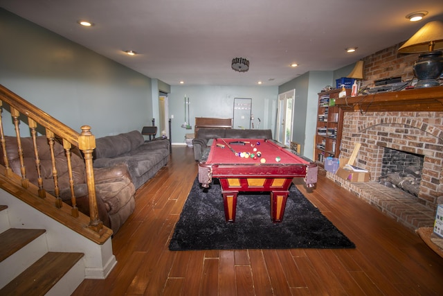 301 N Gregg Rd, Nixa, MO 65714 - recreation room with wood finished floors, billiards, a brick fireplace, and recessed lighting