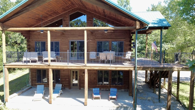 20816 Valley View Trl, Wheatland, MO 65779 - back of property with ceiling fan, a patio, and log siding