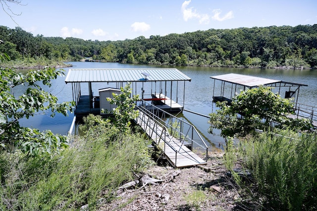 20816 Valley View Trl, Wheatland, MO 65779 - dock area featuring a view of trees and a water view