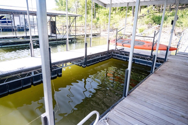 20816 Valley View Trl, Wheatland, MO 65779 - dock area with boat lift and a water view
