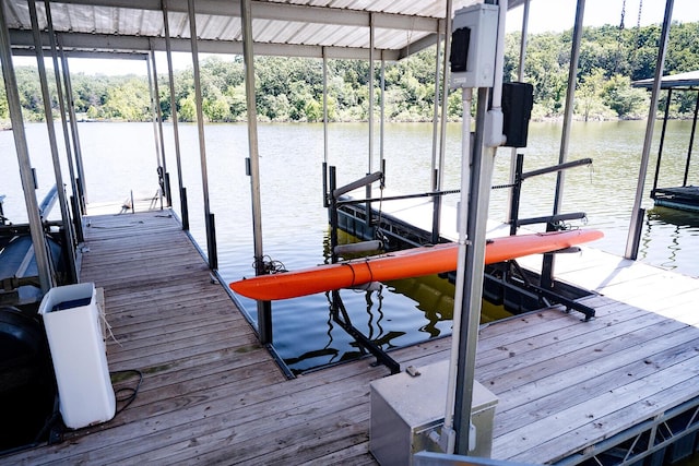 20816 Valley View Trl, Wheatland, MO 65779 - dock area featuring boat lift, a water view, and view of scattered trees