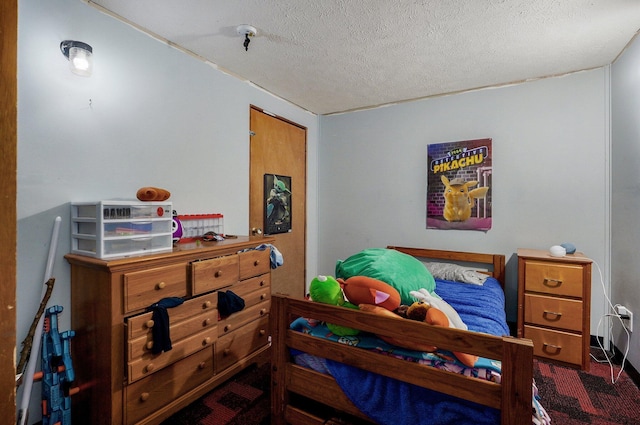 528 N Locust St, Marshfield, MO 65706 - carpeted bedroom featuring a textured ceiling