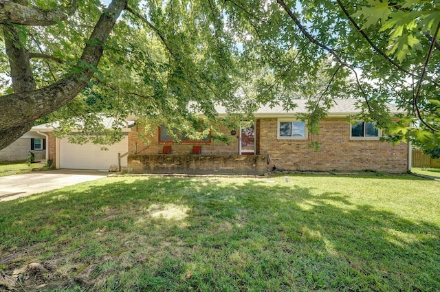 528 N Locust St, Marshfield, MO 65706 - view of front facade featuring brick siding, concrete driveway, a front lawn, and an attached garage