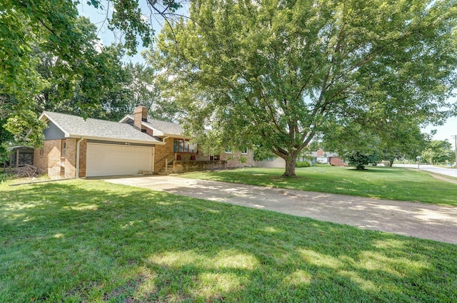 528 N Locust St, Marshfield, MO 65706 - view of front of house featuring brick siding, a front lawn, concrete driveway, a garage, and a chimney