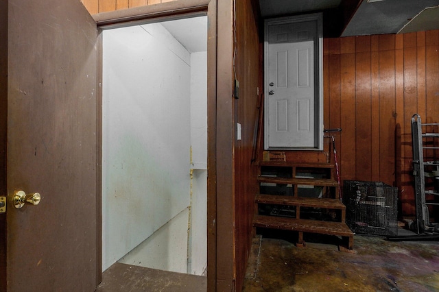 528 N Locust St, Marshfield, MO 65706 - stairway featuring wooden walls and concrete flooring