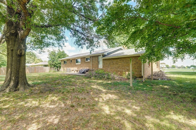 528 N Locust St, Marshfield, MO 65706 - rear view of property featuring brick siding