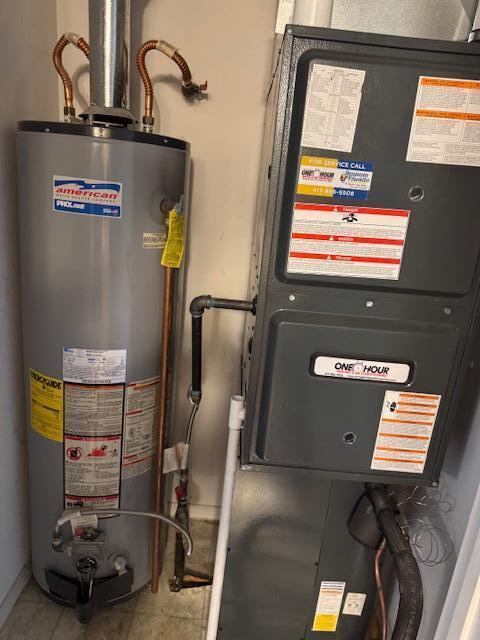 1359 W Stone House Rd, Nixa, MO 65714 - utilities with water heater and heating unit