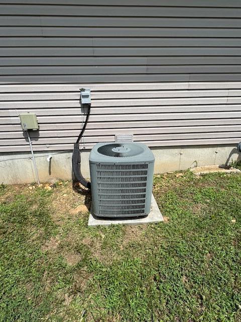 1359 W Stone House Rd, Nixa, MO 65714 - exterior view of a central AC unit