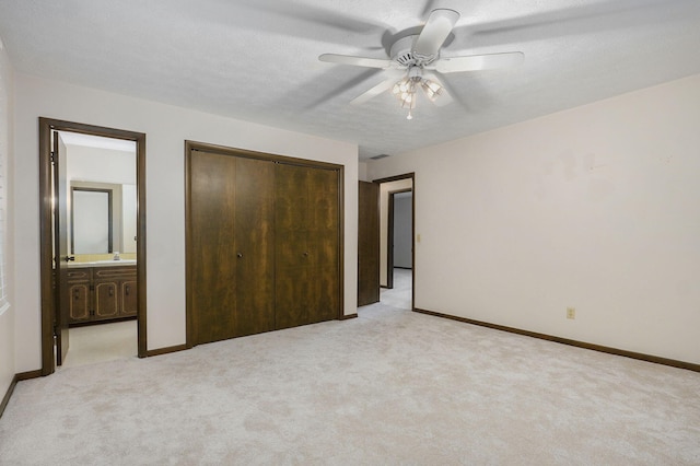 3520 E Carol Dr, Springfield, MO 65809 - unfurnished bedroom with light colored carpet, a closet, ensuite bath, and ceiling fan