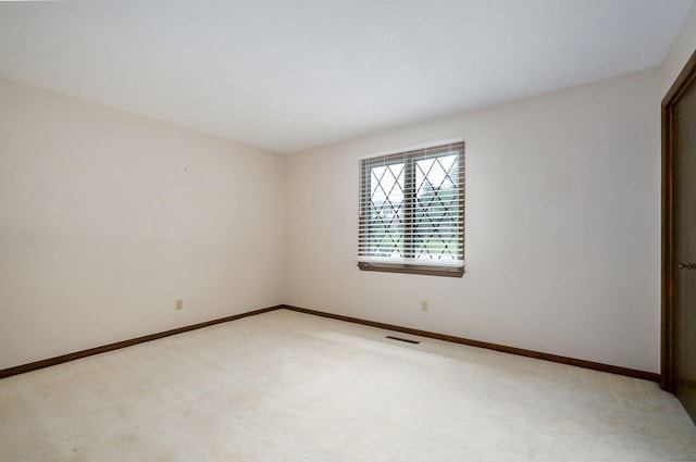 3520 E Carol Dr, Springfield, MO 65809 - spare room with light colored carpet and baseboards