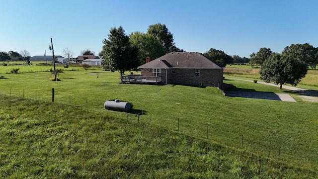 2131 Redoak Rd, Fordland, MO 65652 - view of green lawn with a deck