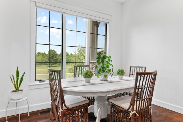 6421 S Valley Brook Ct, Springfield, MO 65810 - dining room featuring healthy amount of natural light and wood finished floors