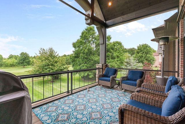 6421 S Valley Brook Ct, Springfield, MO 65810 - wooden deck with grilling area, view of wooded area, and an outdoor living space