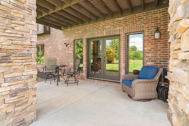 6421 S Valley Brook Ct, Springfield, MO 65810 - view of patio featuring french doors