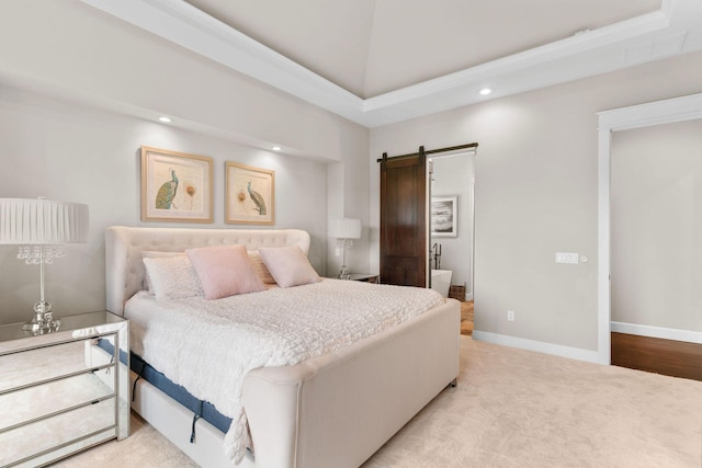 6421 S Valley Brook Ct, Springfield, MO 65810 - bedroom featuring a barn door, light colored carpet, recessed lighting, and a high ceiling