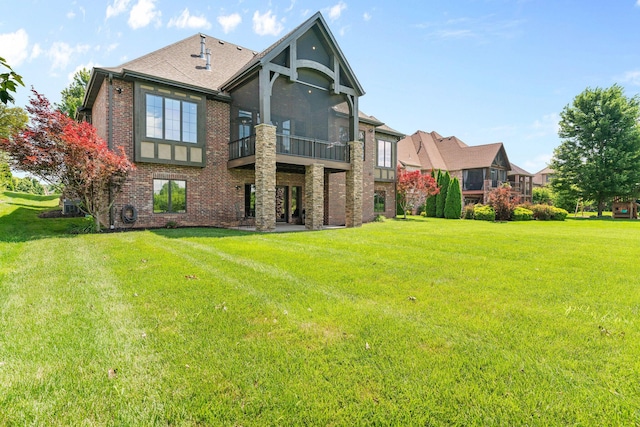 6421 S Valley Brook Ct, Springfield, MO 65810 - rear view of house featuring brick siding, a lawn, and roof with shingles