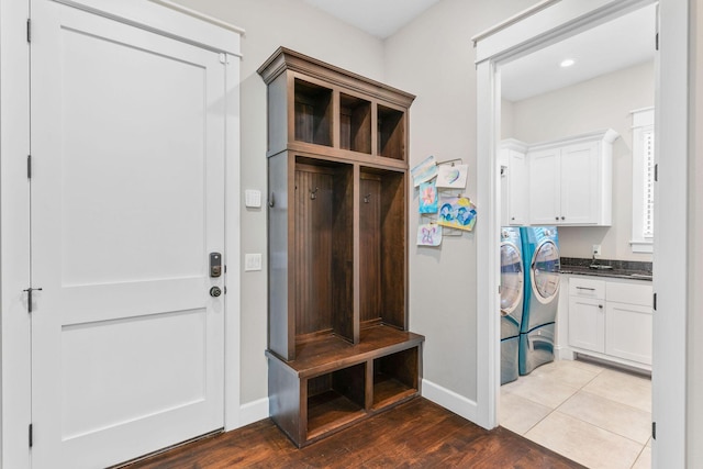 6421 S Valley Brook Ct, Springfield, MO 65810 - mudroom with separate washer and dryer and wood finished floors