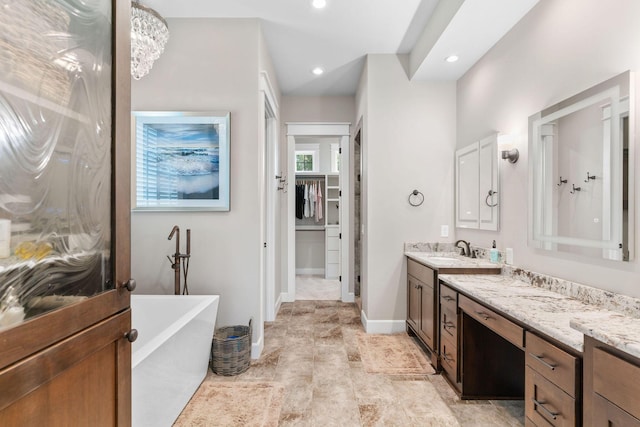 6421 S Valley Brook Ct, Springfield, MO 65810 - full bathroom with a soaking tub, vanity, a spacious closet, and recessed lighting